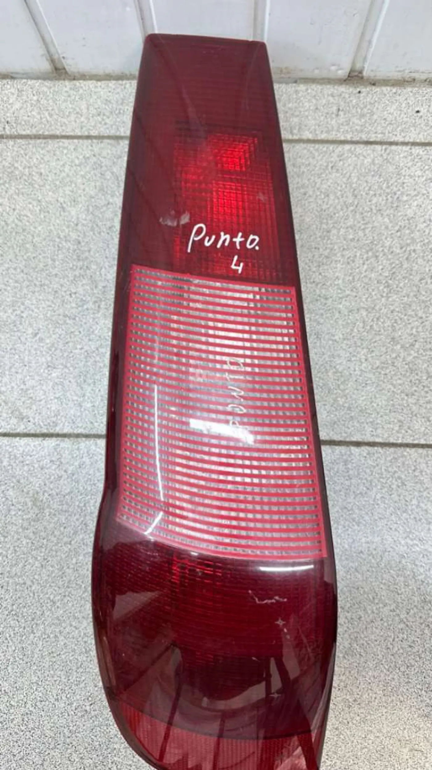 Фонарь задний левый к Fiat Punto 1998