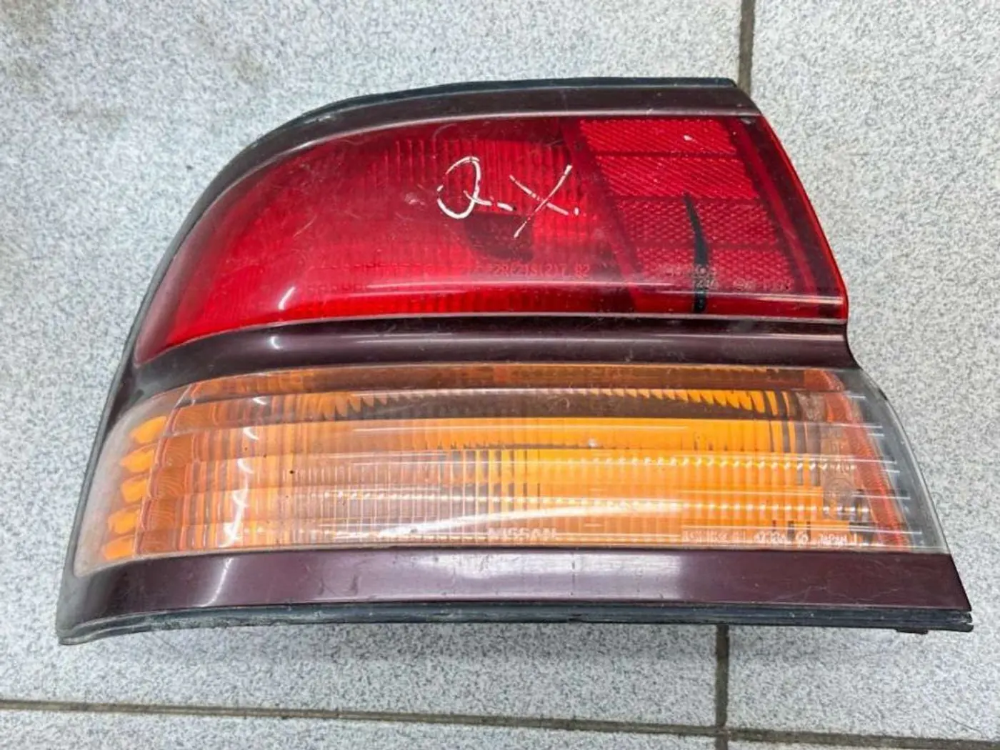 Фонарь задний левый к Nissan Maxima 1994