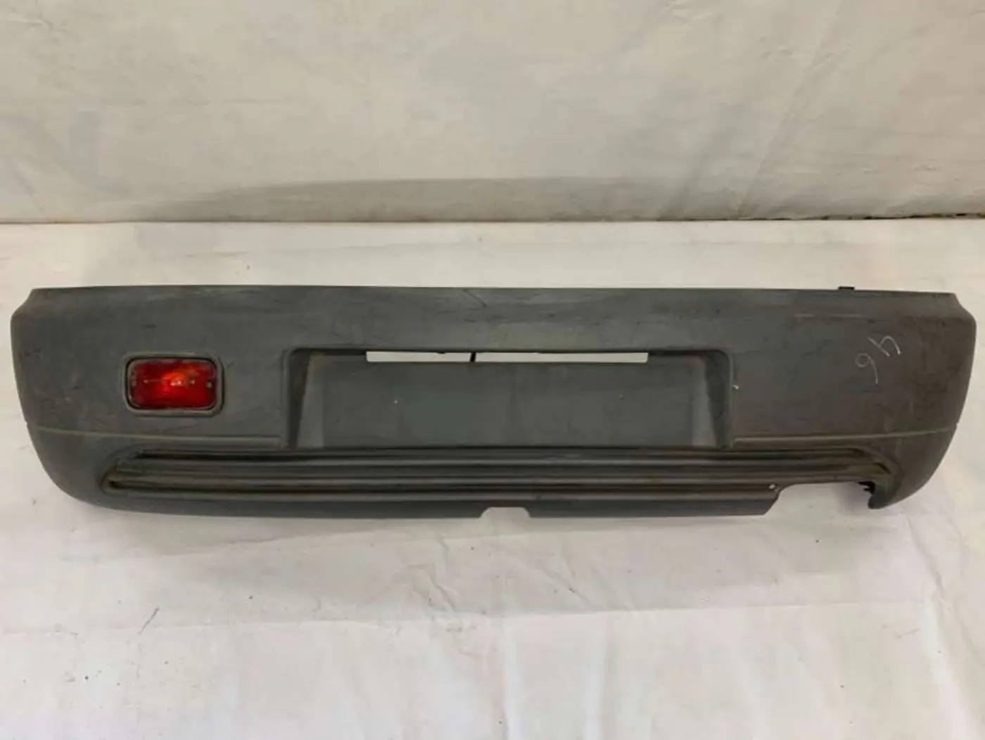 Бампер задний к Mitsubishi Colt 1994