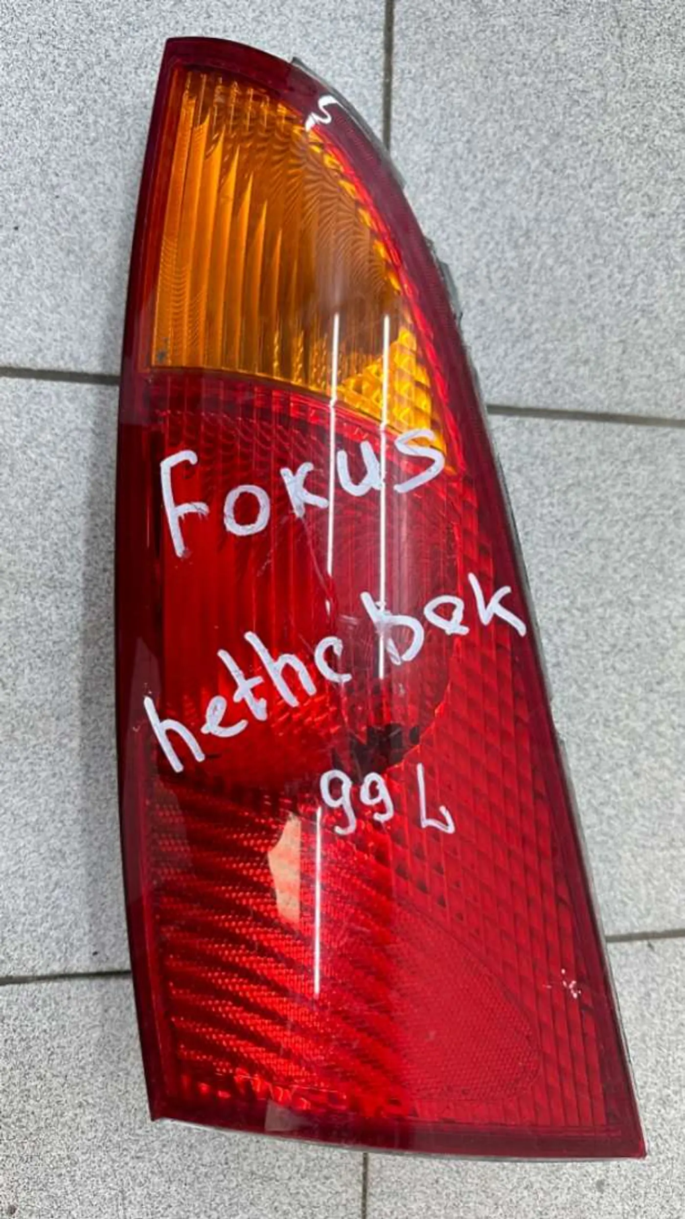 Фонарь задний левый к Ford Focus 1999