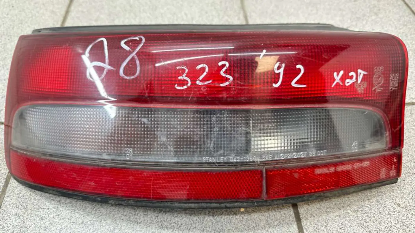 Фонарь задний левый к Mazda 323 1992