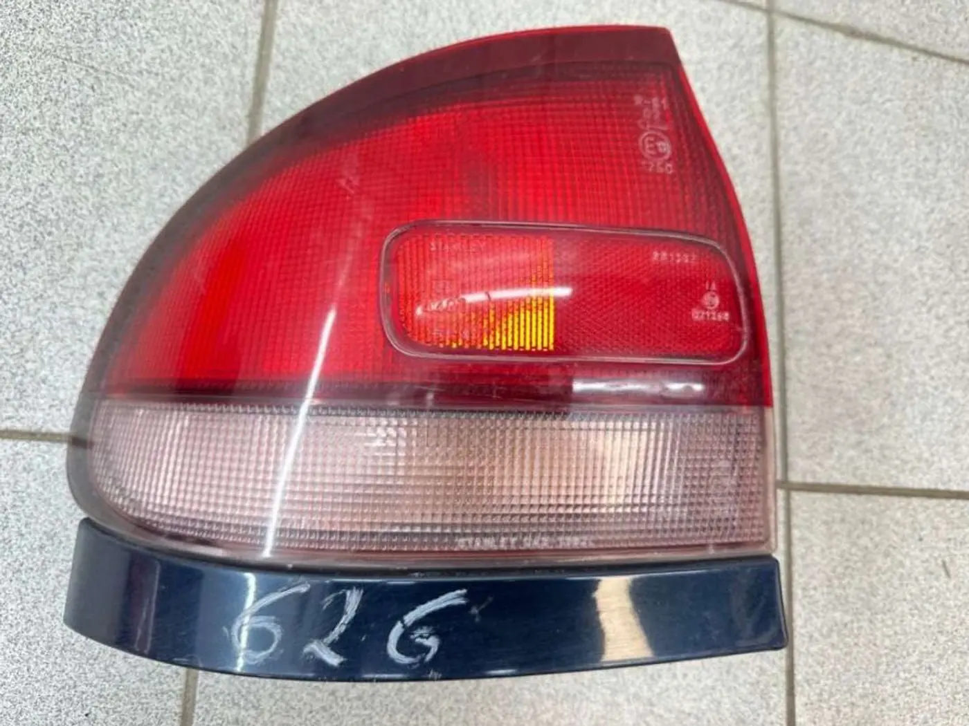 Фонарь задний левый к Mazda 626 1995