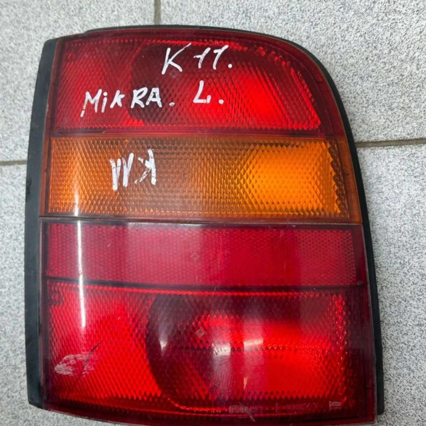 Фонарь задний левый к Nissan Micra 1995
