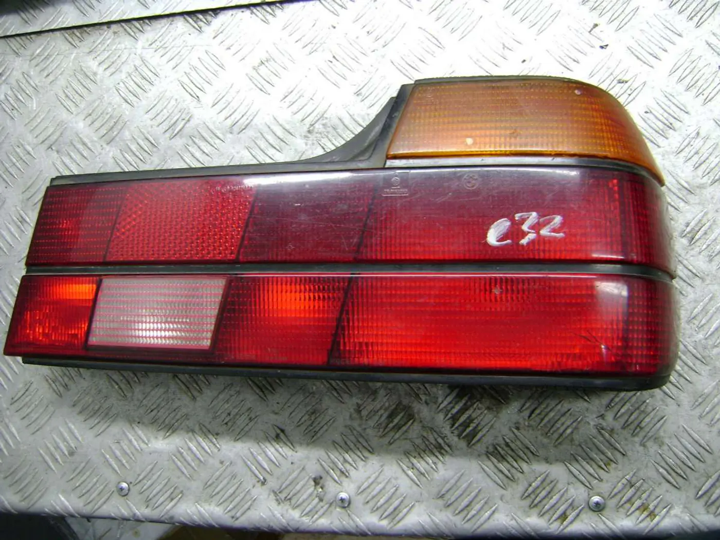 Фонарь задний левый к BMW 7 series 1990