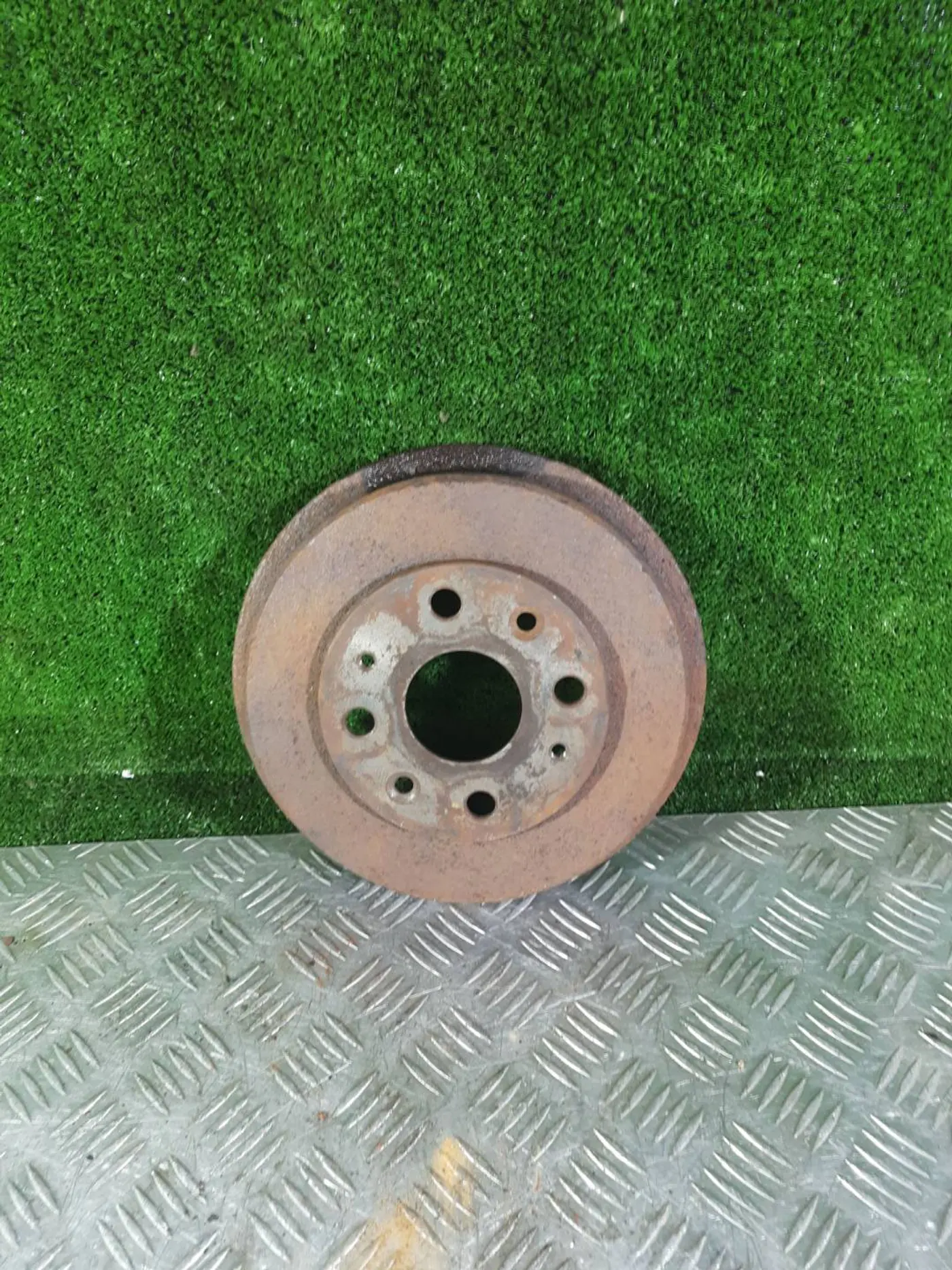 Барабан тормозной к Mazda 323 1997