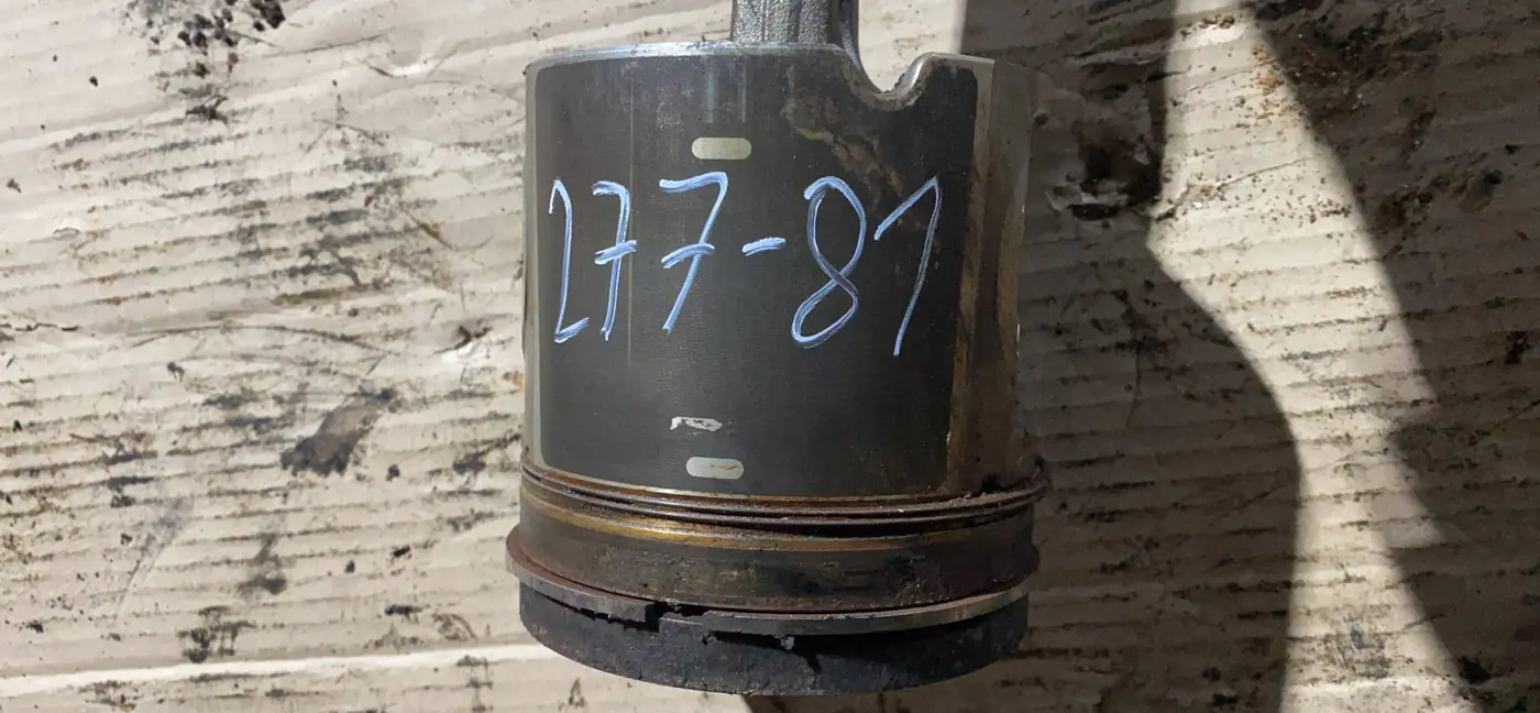 Поршень  124 2003