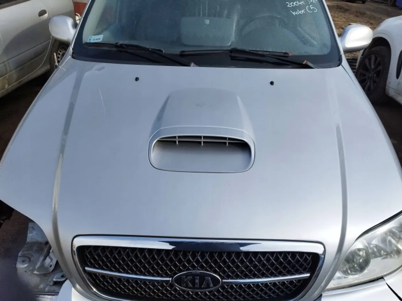 Капот к Kia Carnival 2002