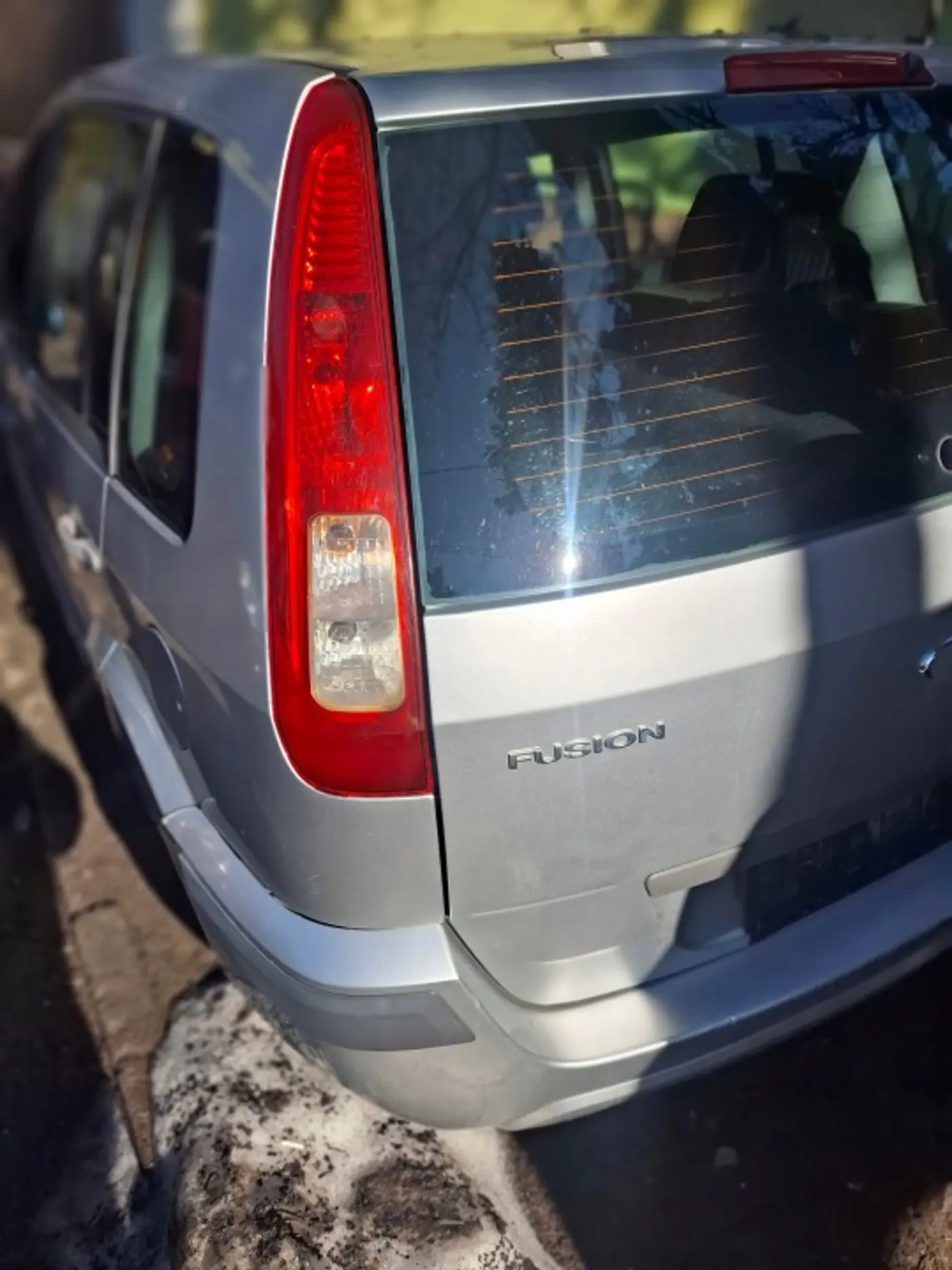 Фонарь задний левый к Ford Fusion 2005
