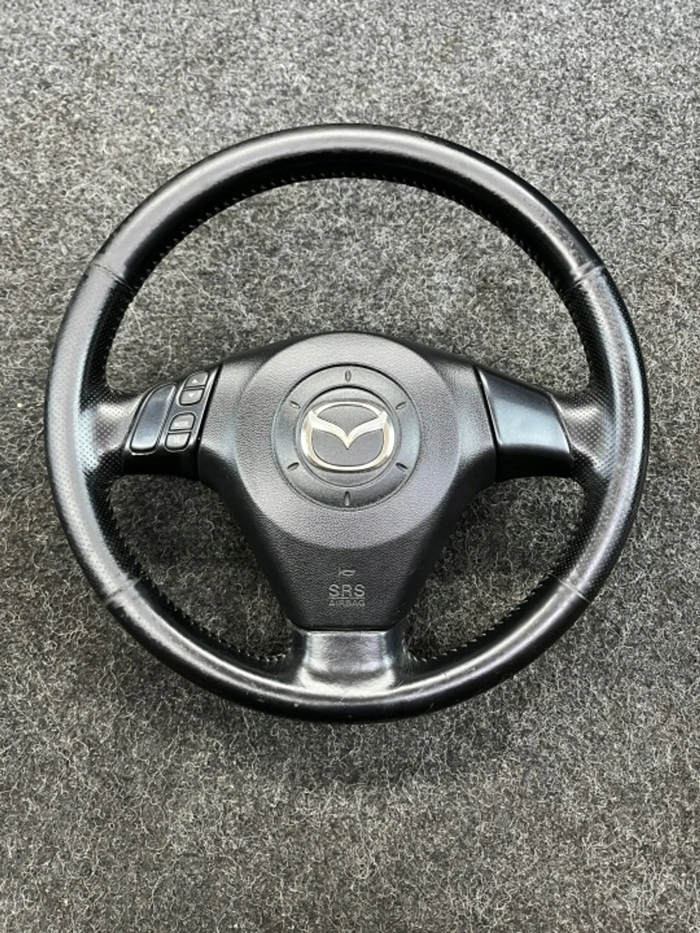 Руль к Mazda 2 2003