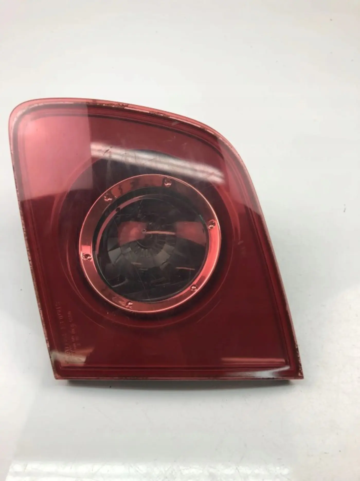 Фонарь задний левый к Mazda 121 1996