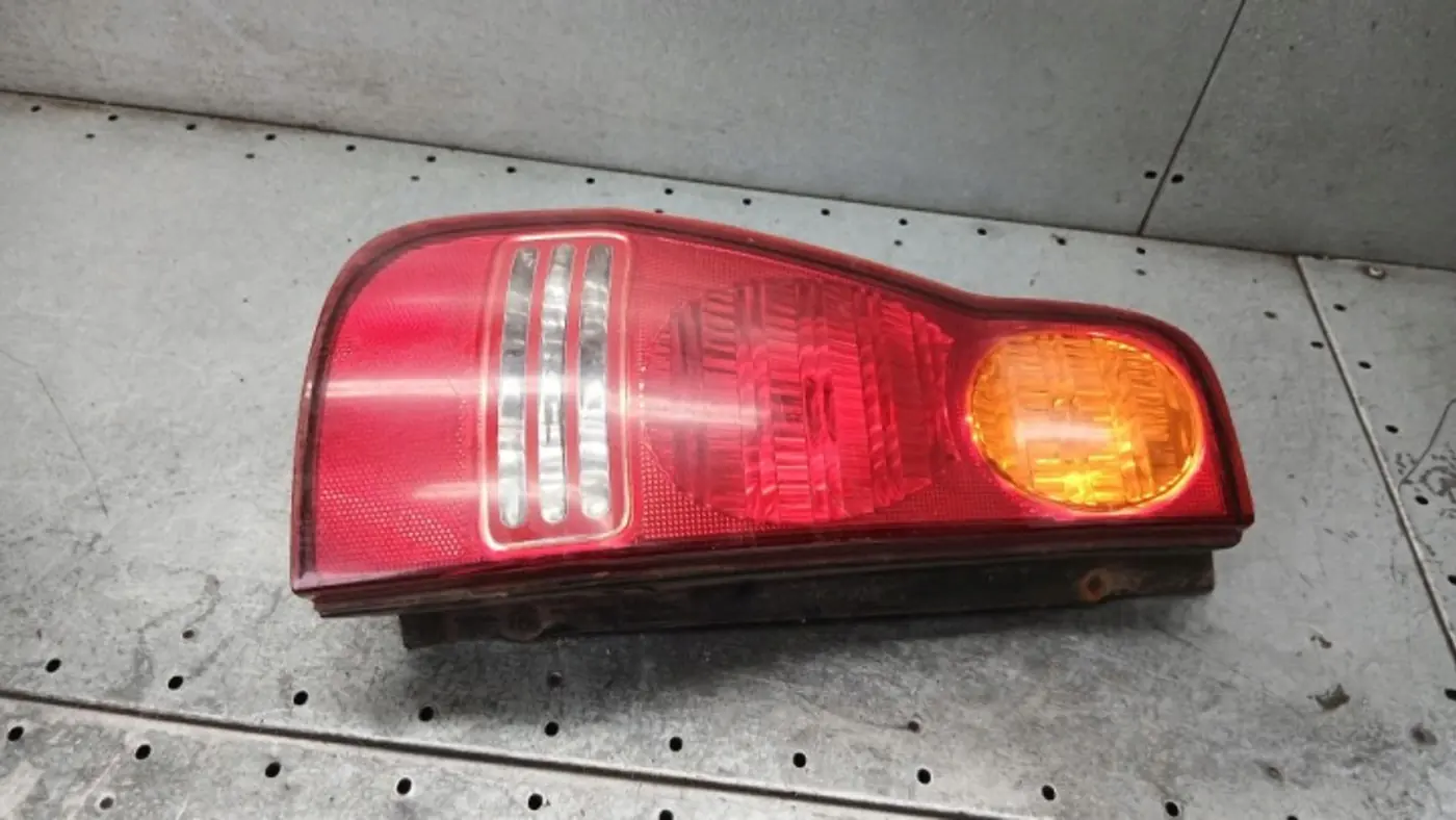 Фонарь задний левый к Hyundai Matrix 2001