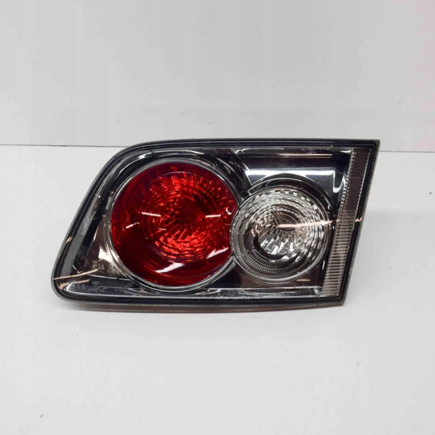 Фонарь задний правый к Mazda 121 1996