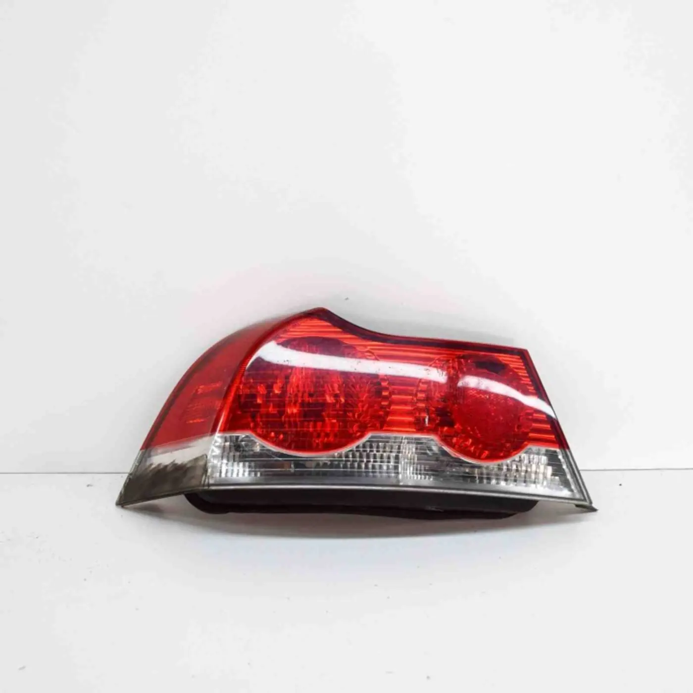 Фонарь задний левый к Volvo C70 2005