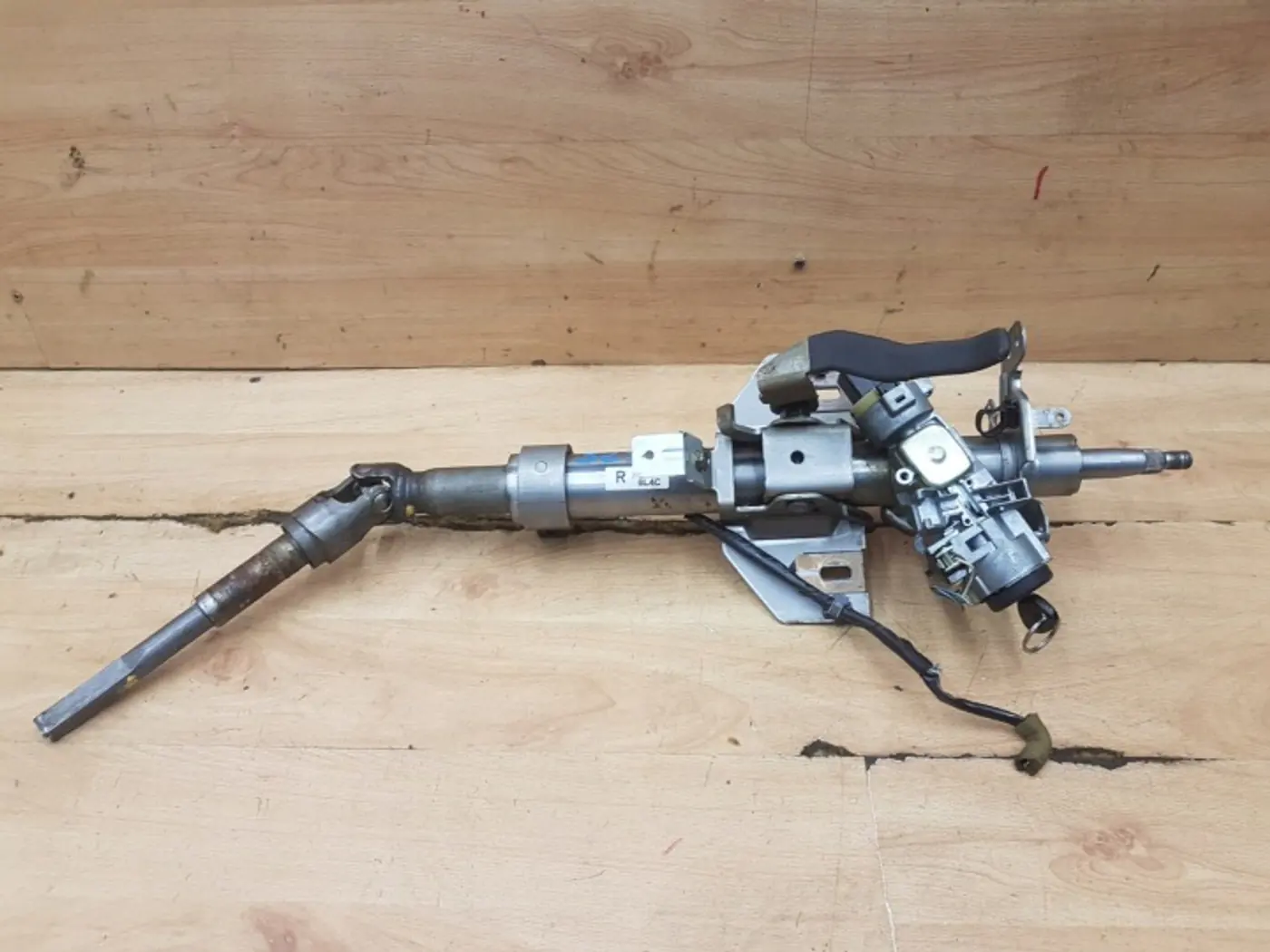 Рулевая колонка к Mazda 323 2000