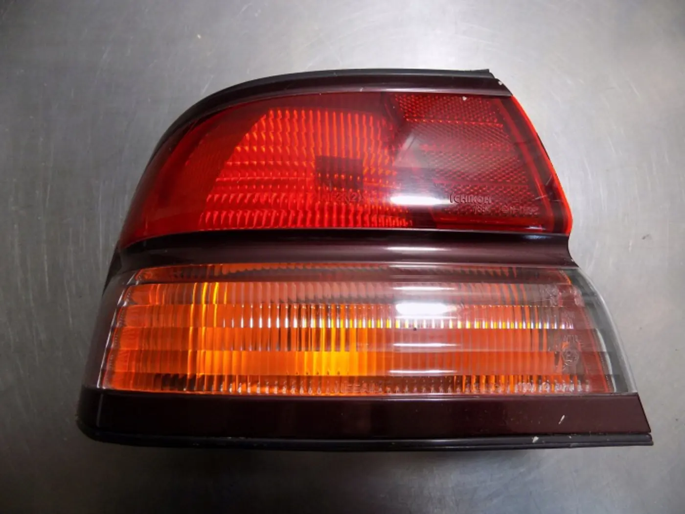 Фонарь задний левый к Nissan Maxima 1995