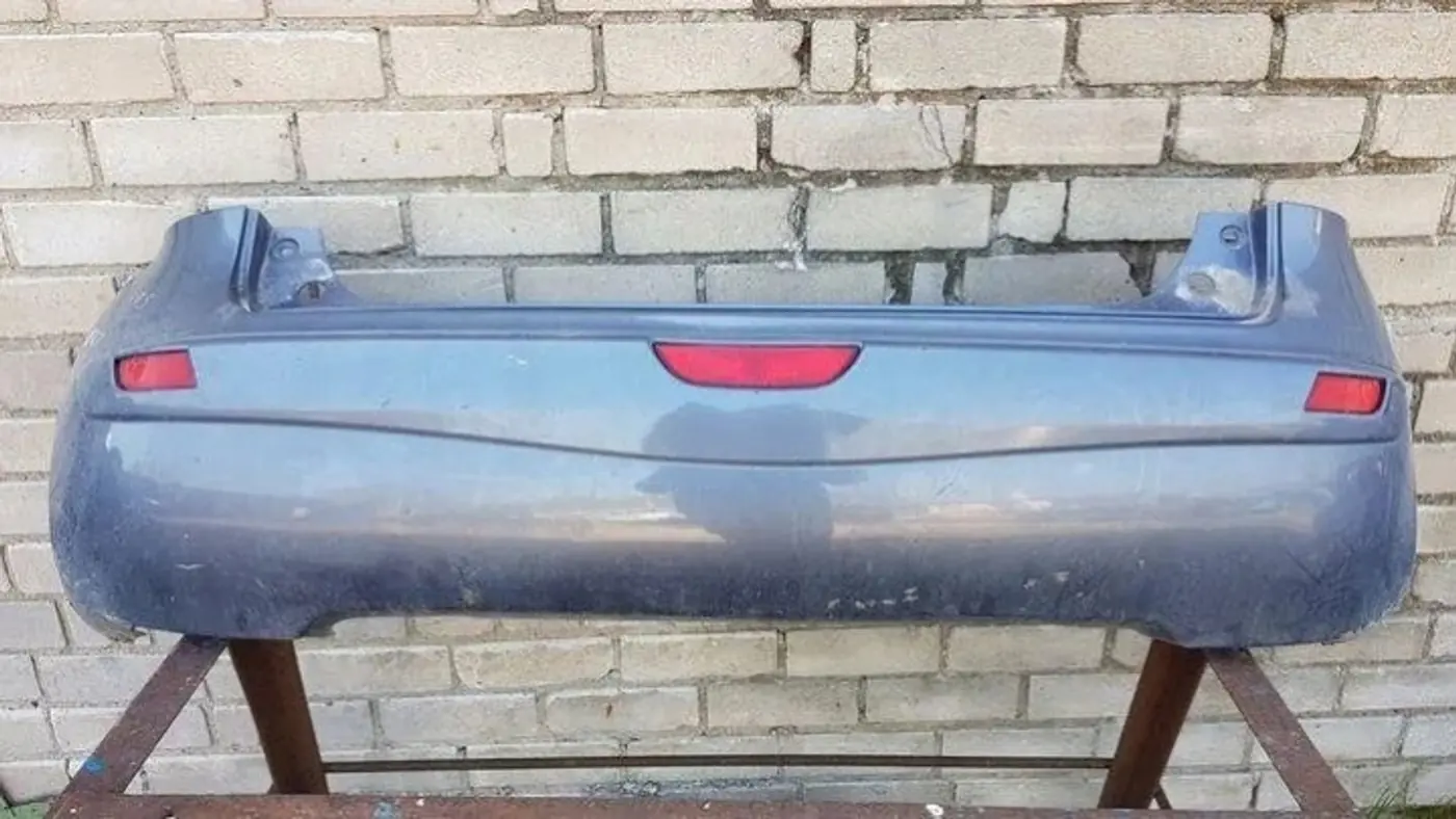 Бампер задний к Nissan Note 2005