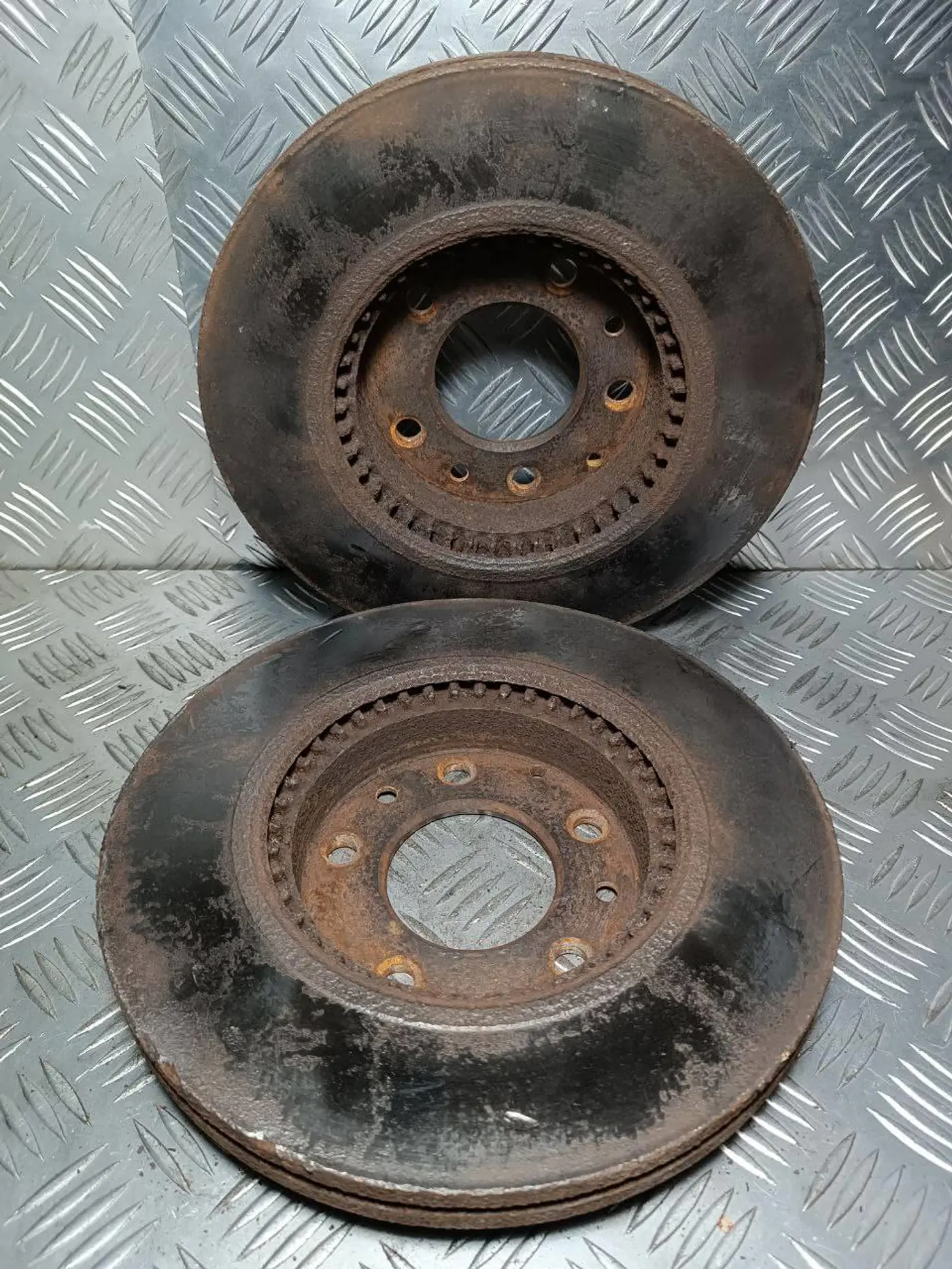 Диск тормозной передний к Mazda 6 2003