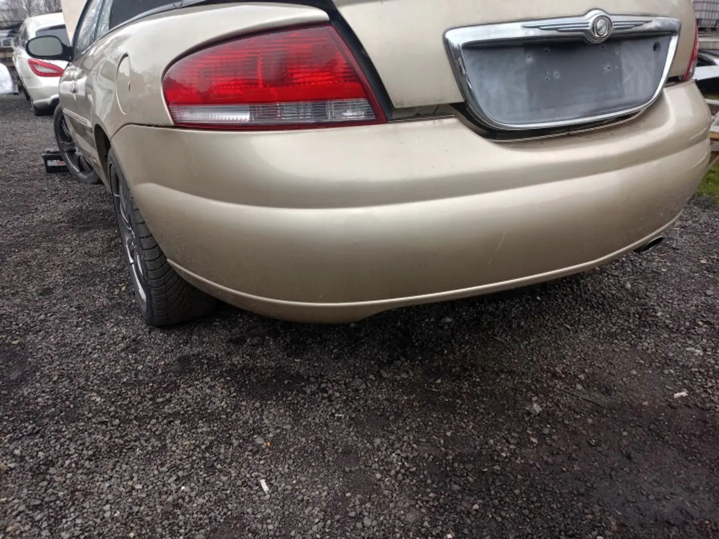 Бампер задний к Chrysler Sebring 1995