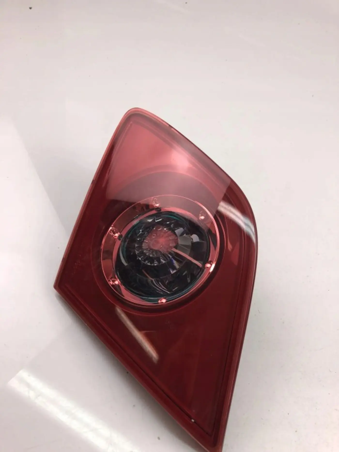 Фонарь задний левый к Mazda 121 1996