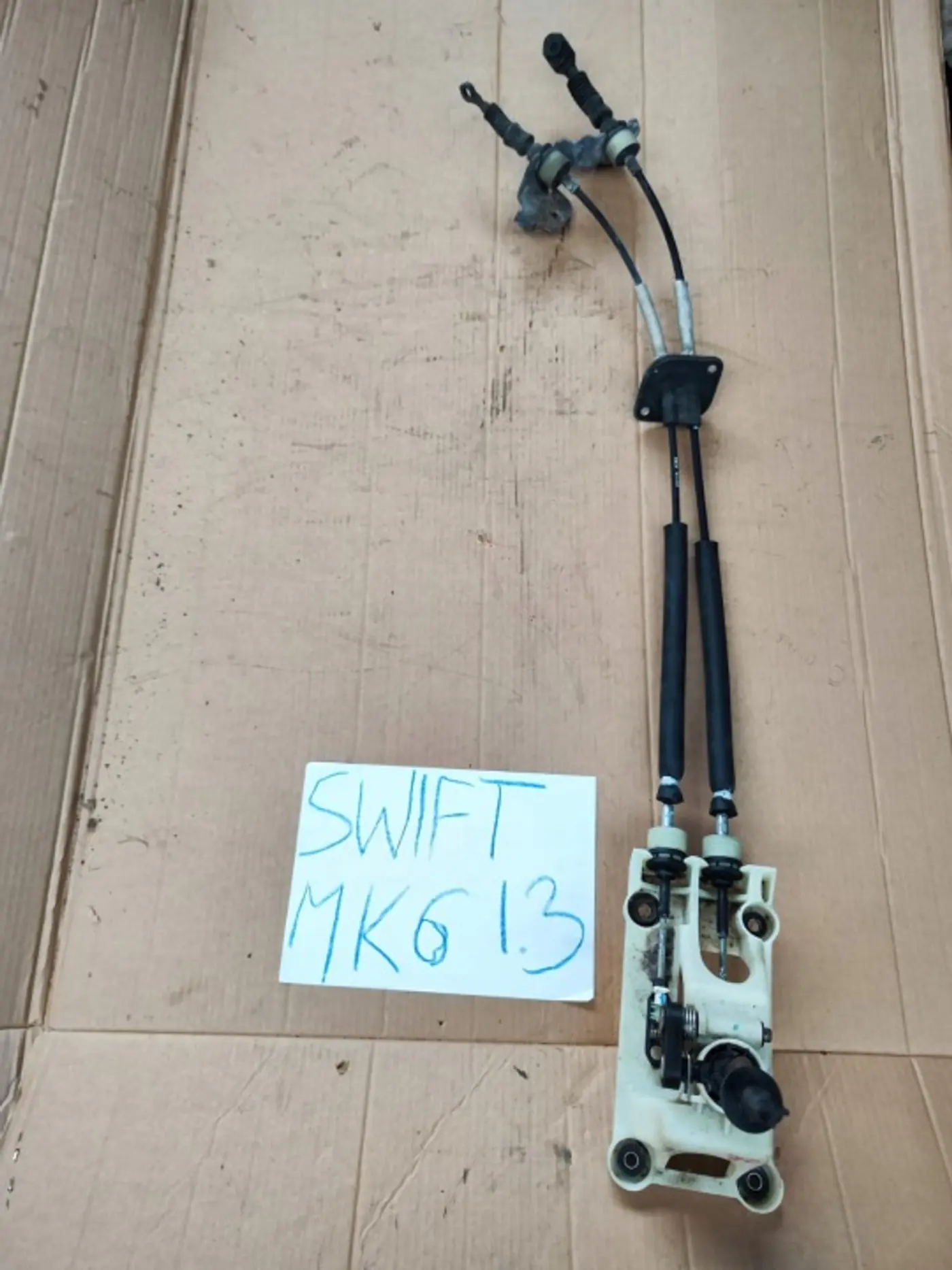 Трос кулисы КПП к Suzuki Swift 2011