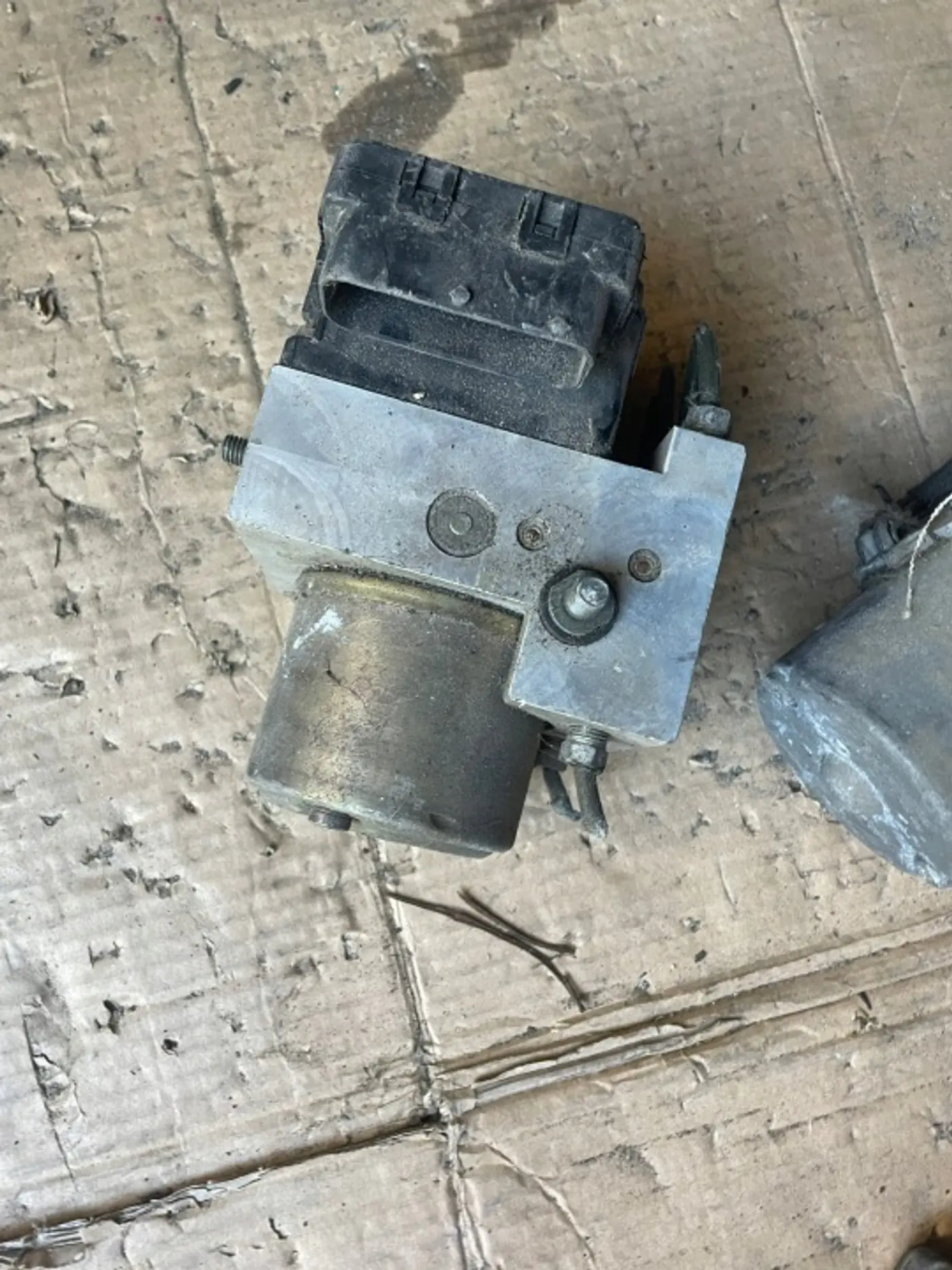 Блок ABS к Daihatsu Sirion 2002