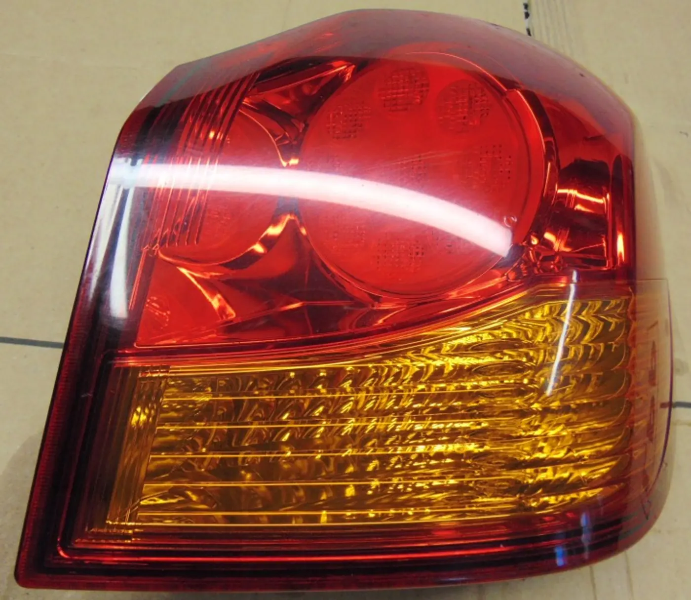 Фонарь задний левый к Mitsubishi i 2006