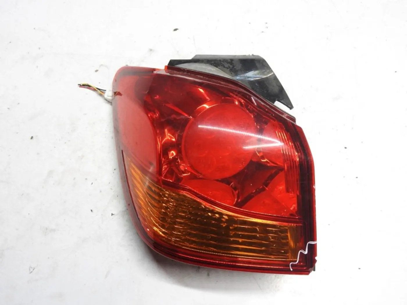 Фонарь задний левый к Mitsubishi i 2006