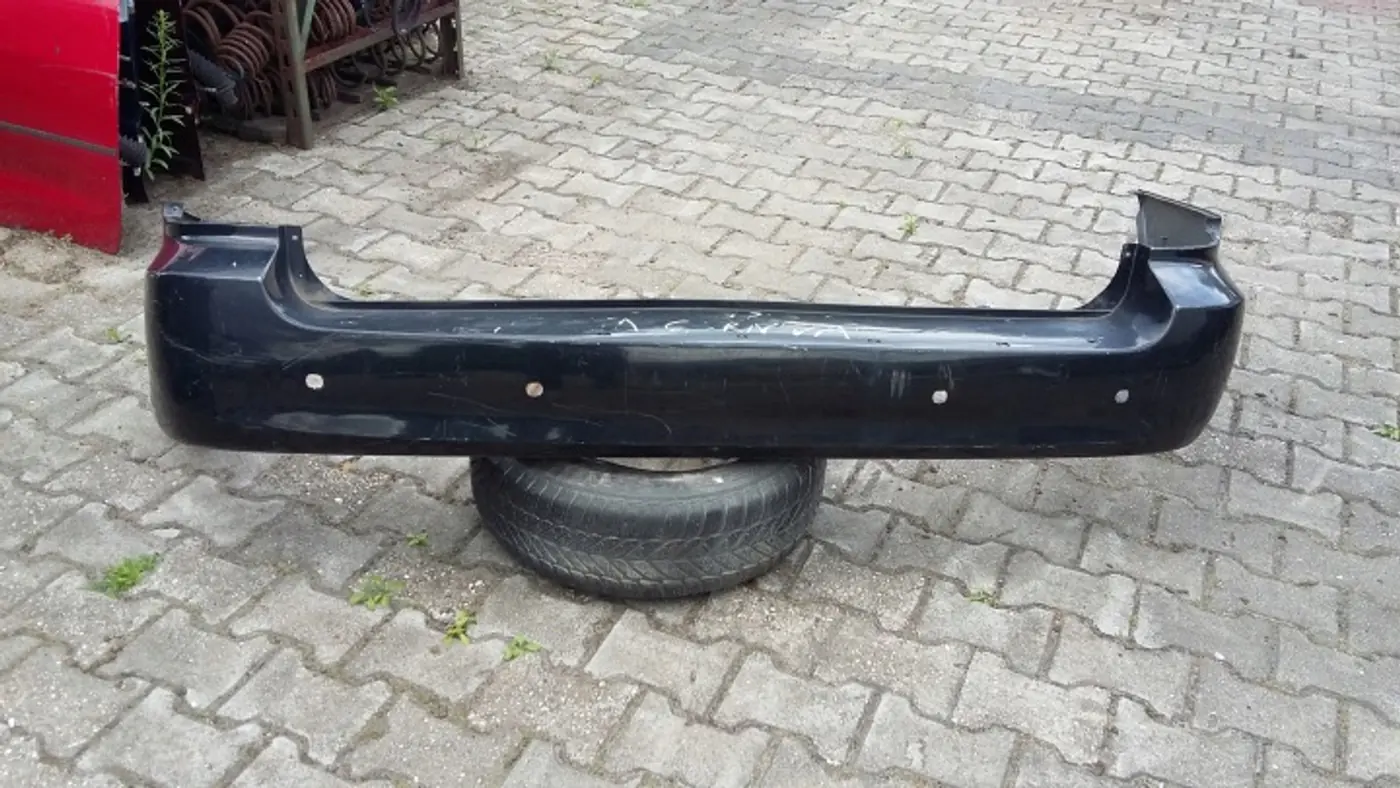 Бампер задний к Kia Carnival 1998