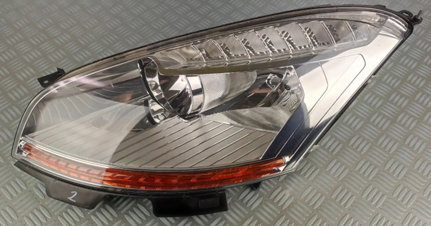 Фара левая к Citroen C3 Picasso 2006