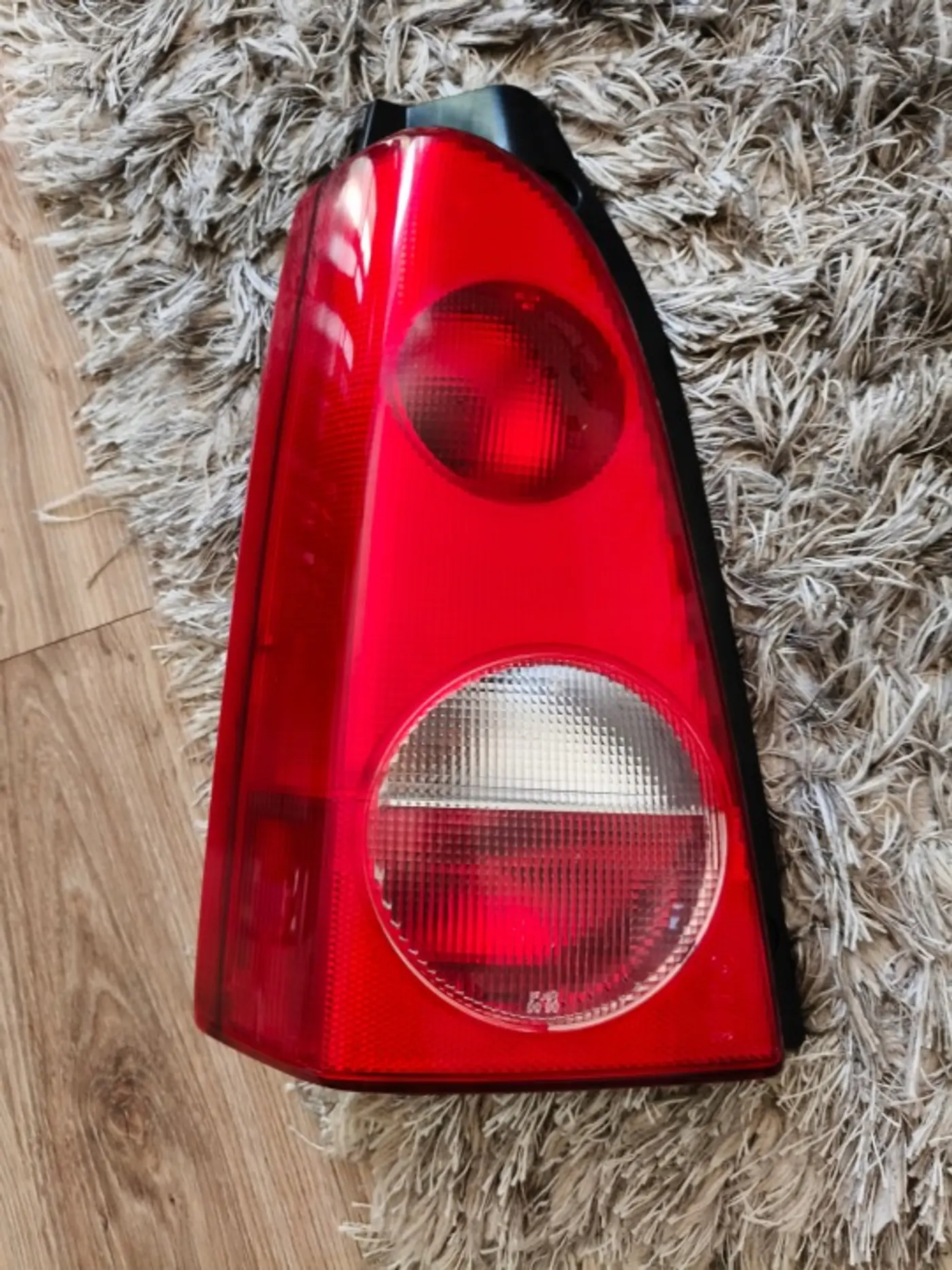 Фонарь задний левый к Opel Agila 2008