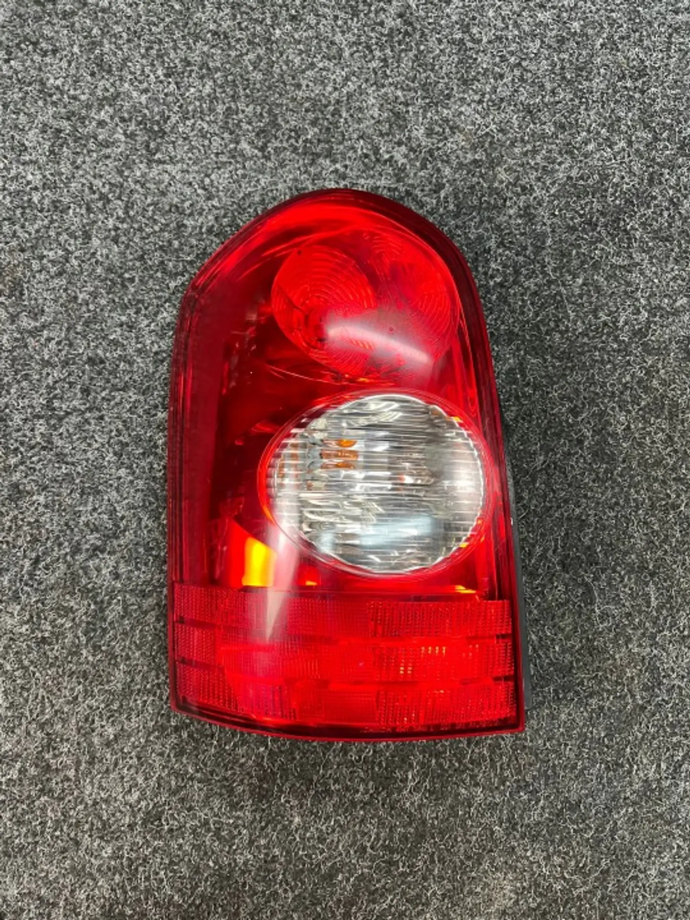 Фонарь задний левый к Mazda MPV 1999