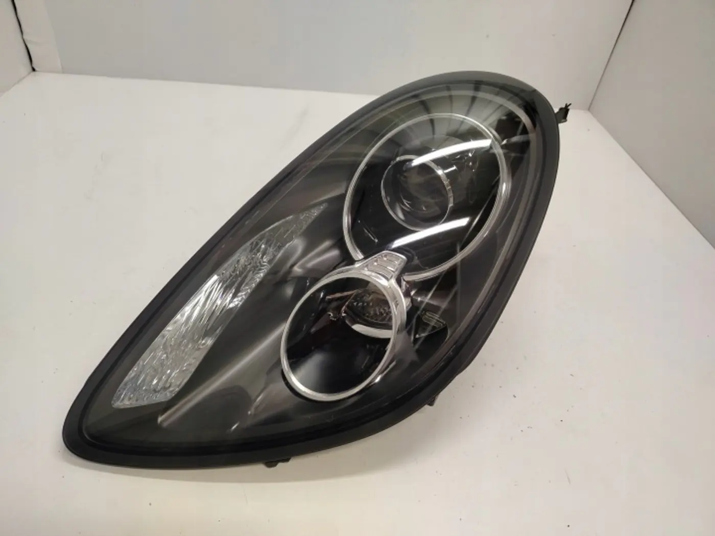 Фара левая к Porsche Boxster 2012