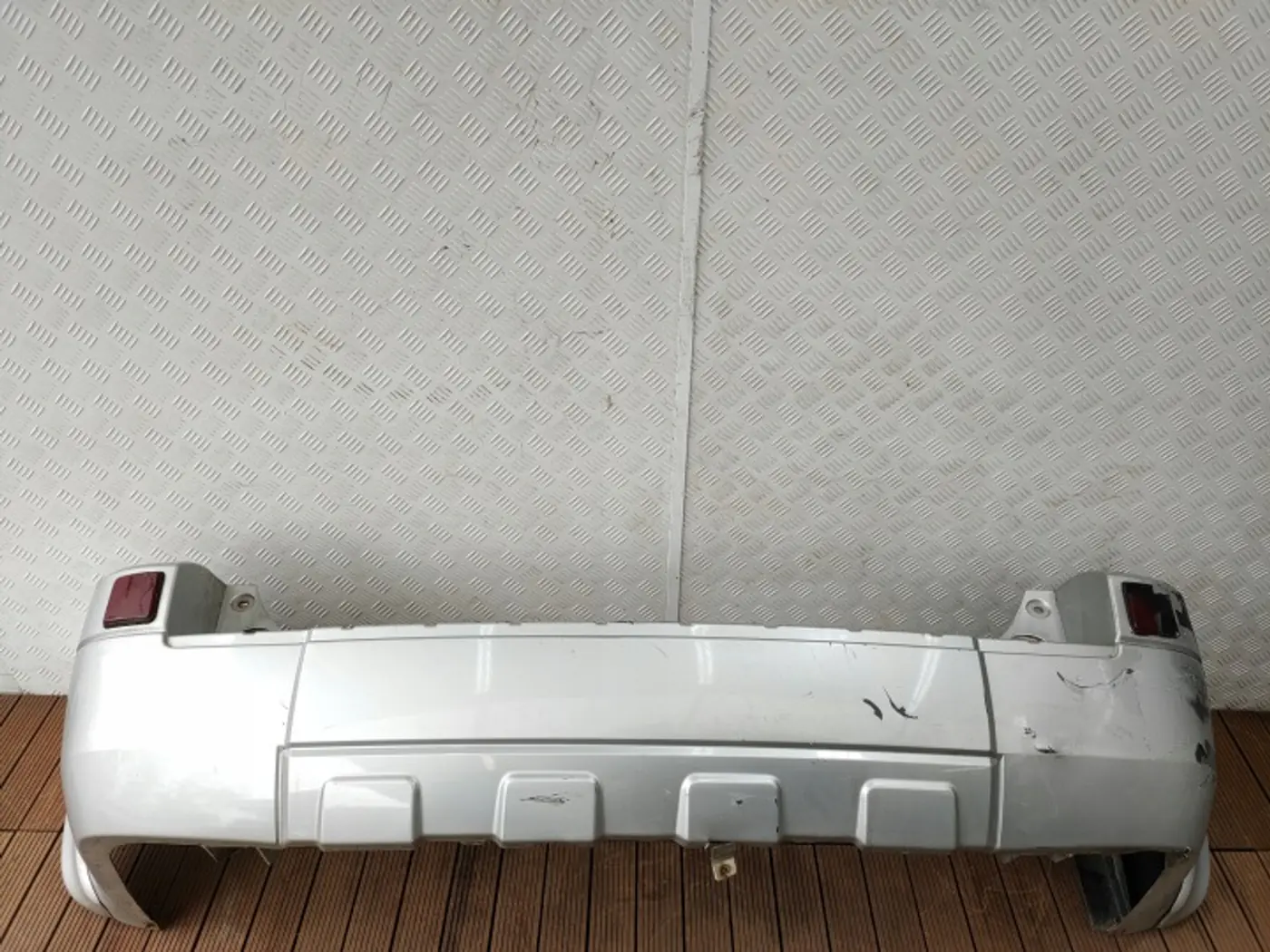 Бампер задний к Ford Maverick 2000