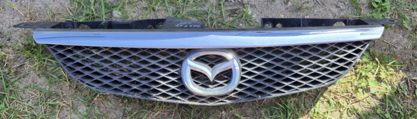 Решетка радиатора к Mazda 323 2000