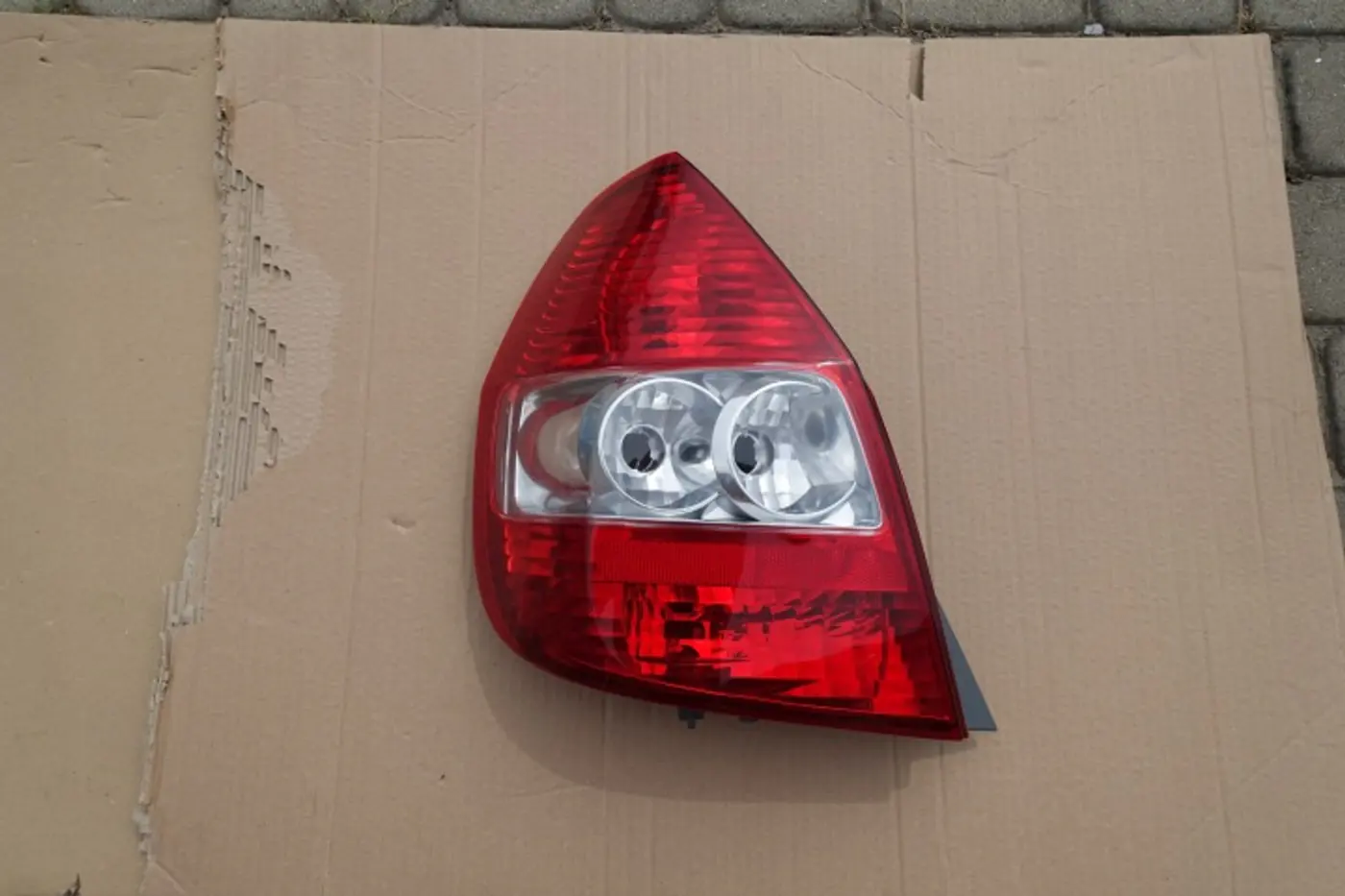 Фонарь задний левый к Honda Jazz 2007