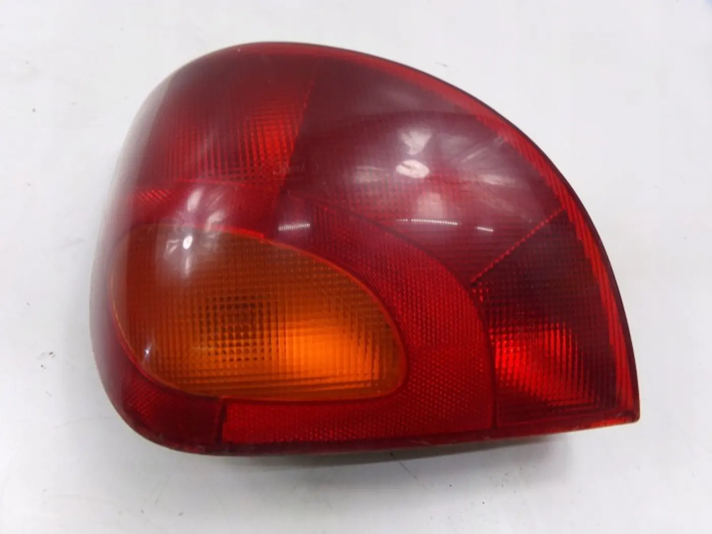 Фонарь задний левый к Mazda 121 1996