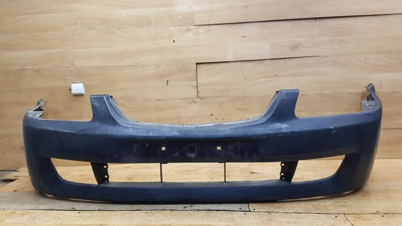 Бампер передний к Mazda 323 1998
