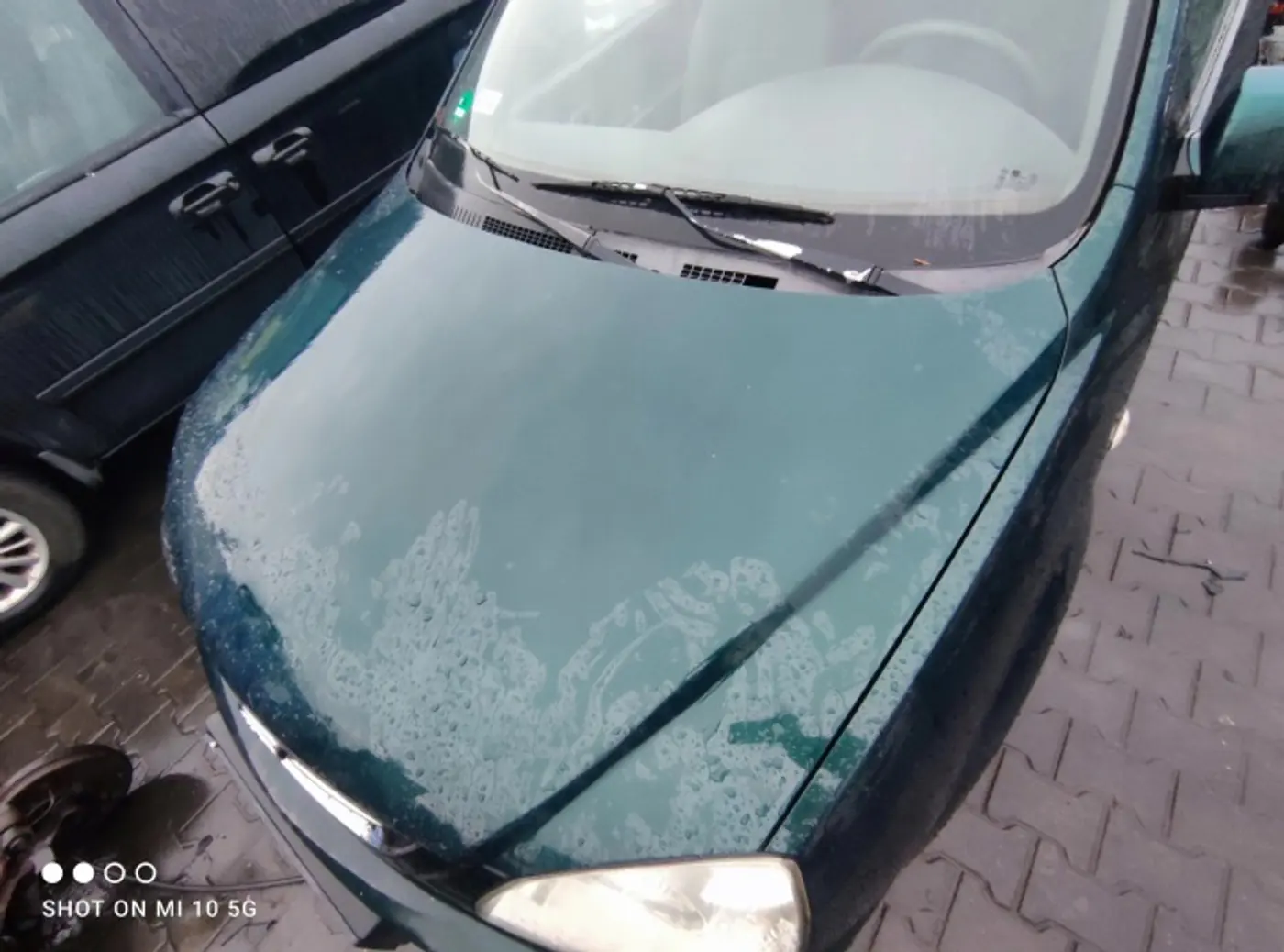 Капот к Kia Carens 2006