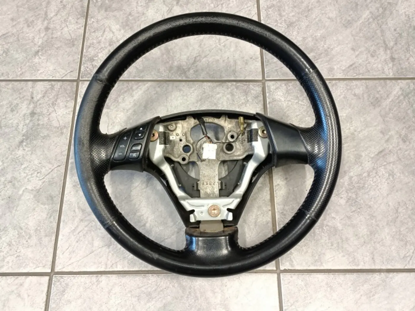 Руль к Mazda 3 2003