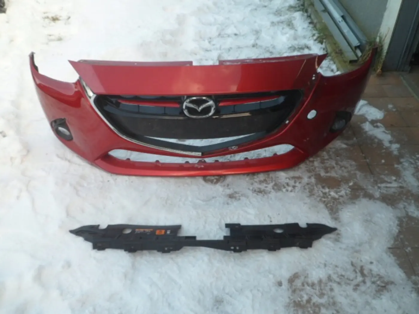 Бампер передний к Mazda 2 2007