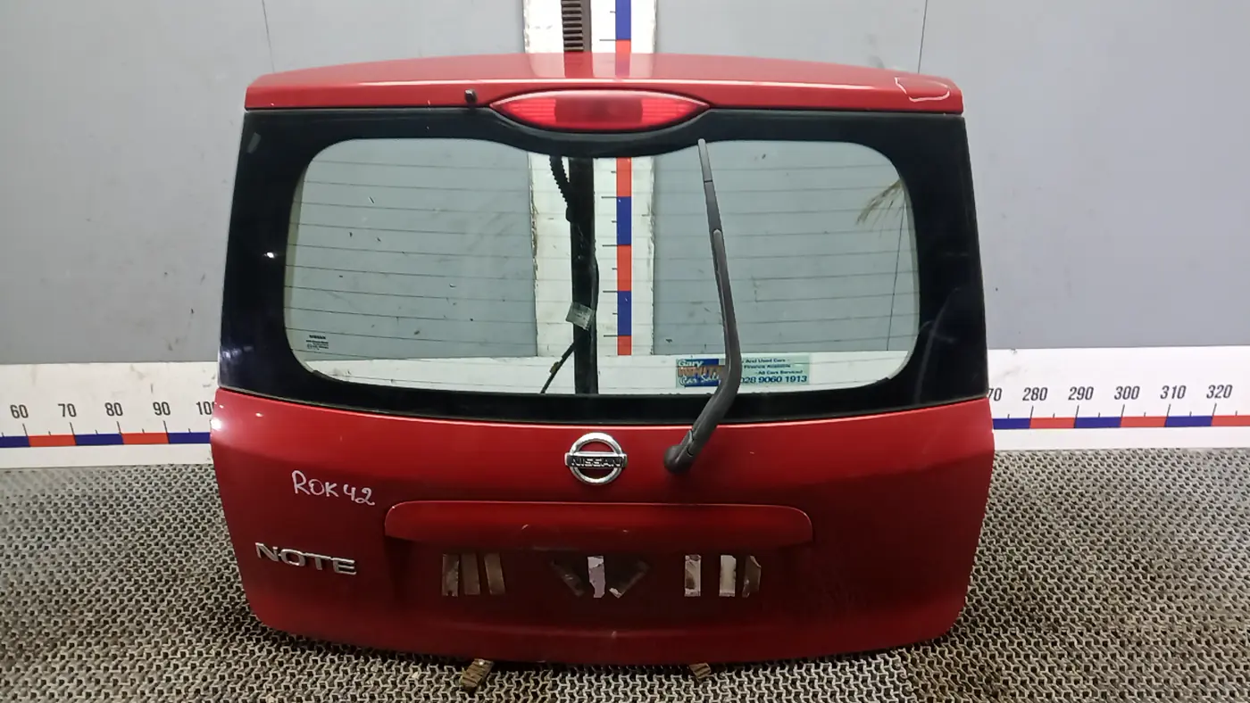 Моторчик стеклоочистителя  к Nissan Note 2008