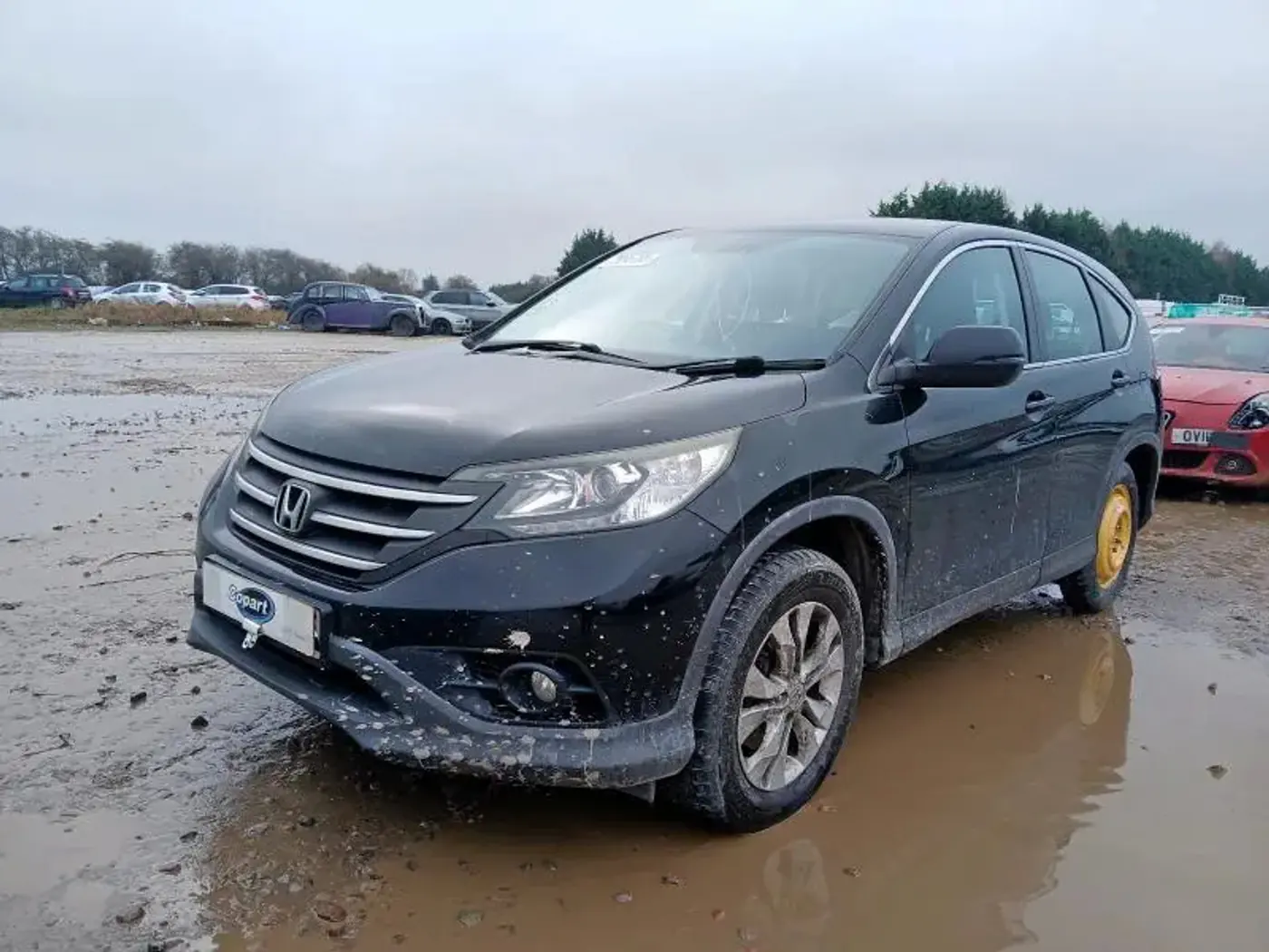 Суппорт задний левый к Honda CR-V 2012