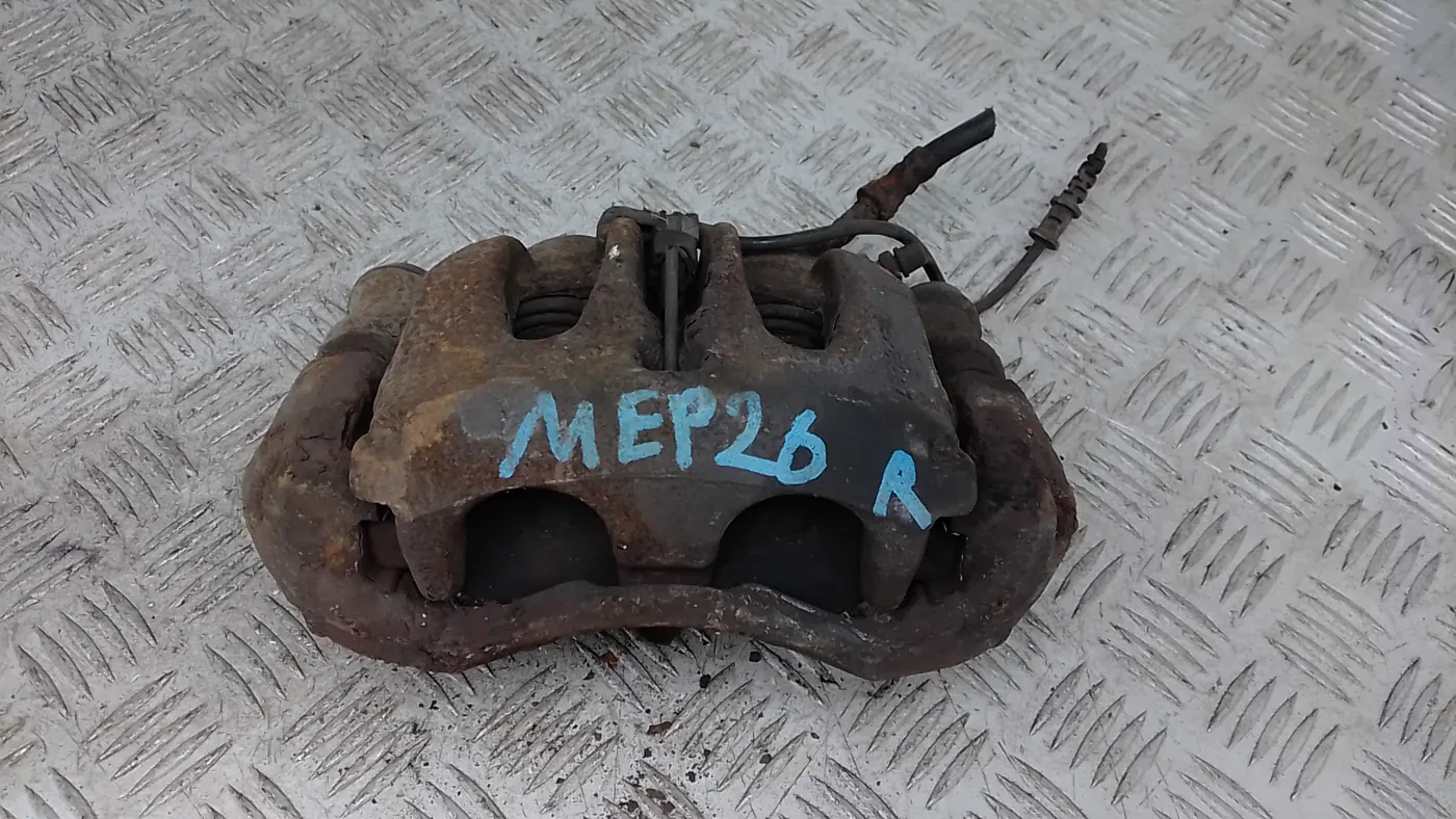 Суппорт передний левый к Volkswagen  2011