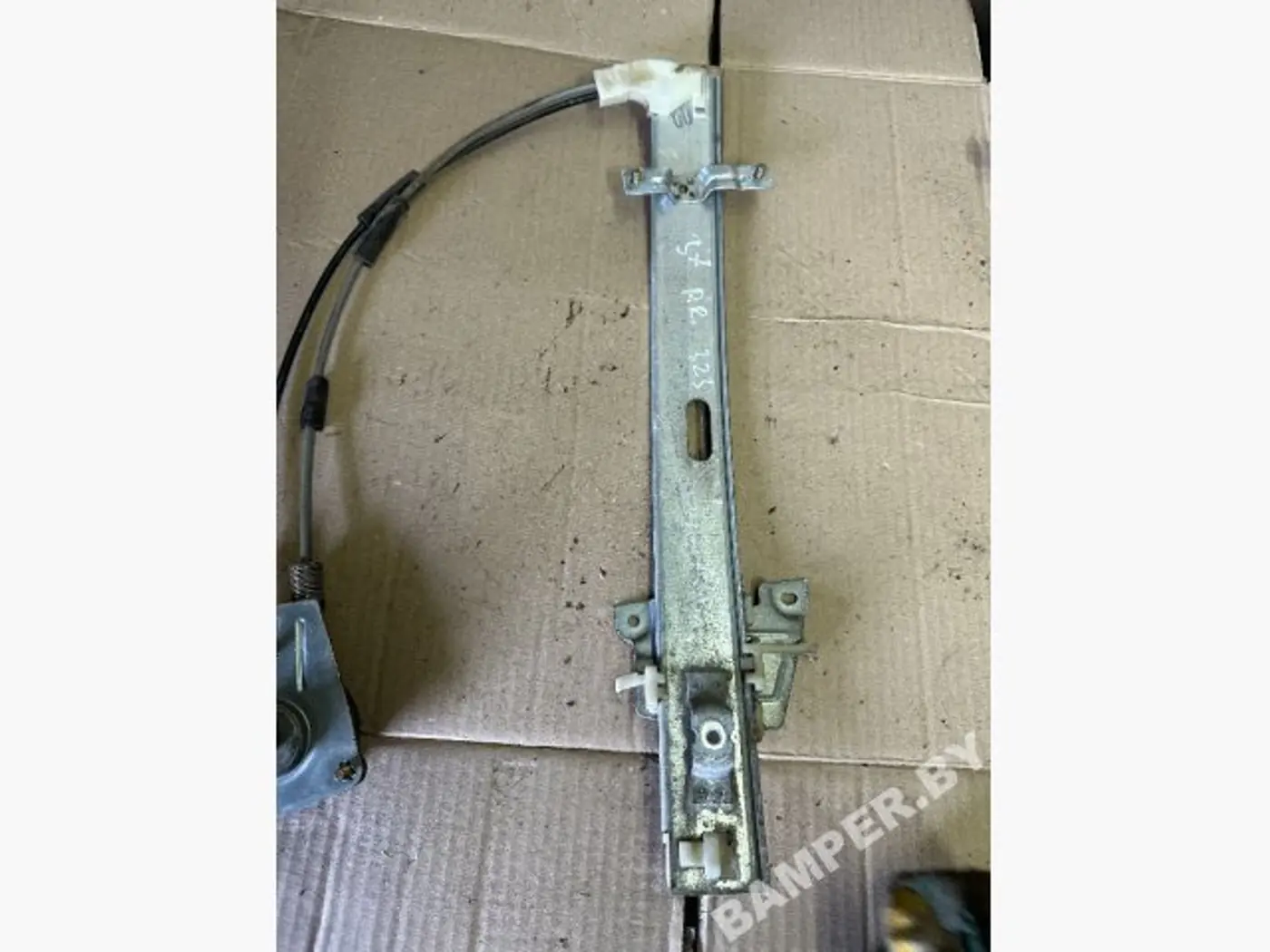 Стеклоподъемник передний правый к Mazda 323 1996