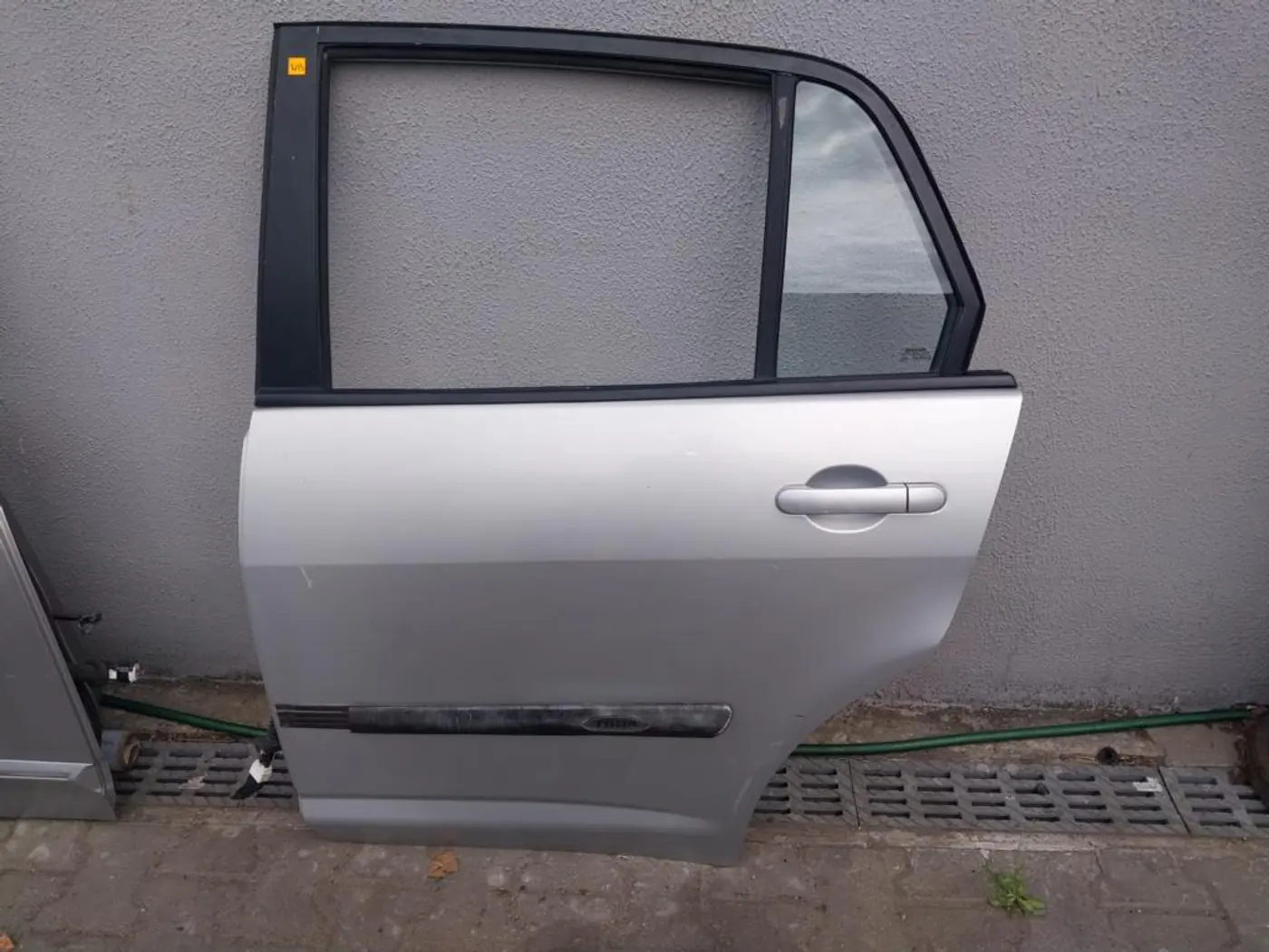 Дверь задняя левая к Nissan Tiida 2008