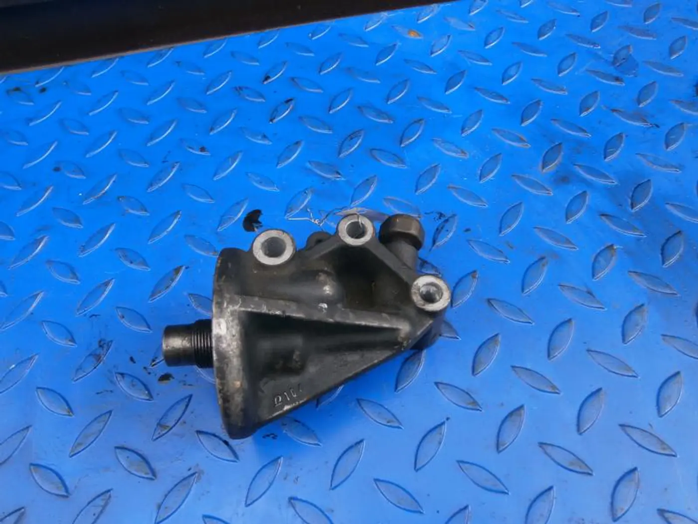 Корпус масляного фильтра к Toyota Corolla 2003