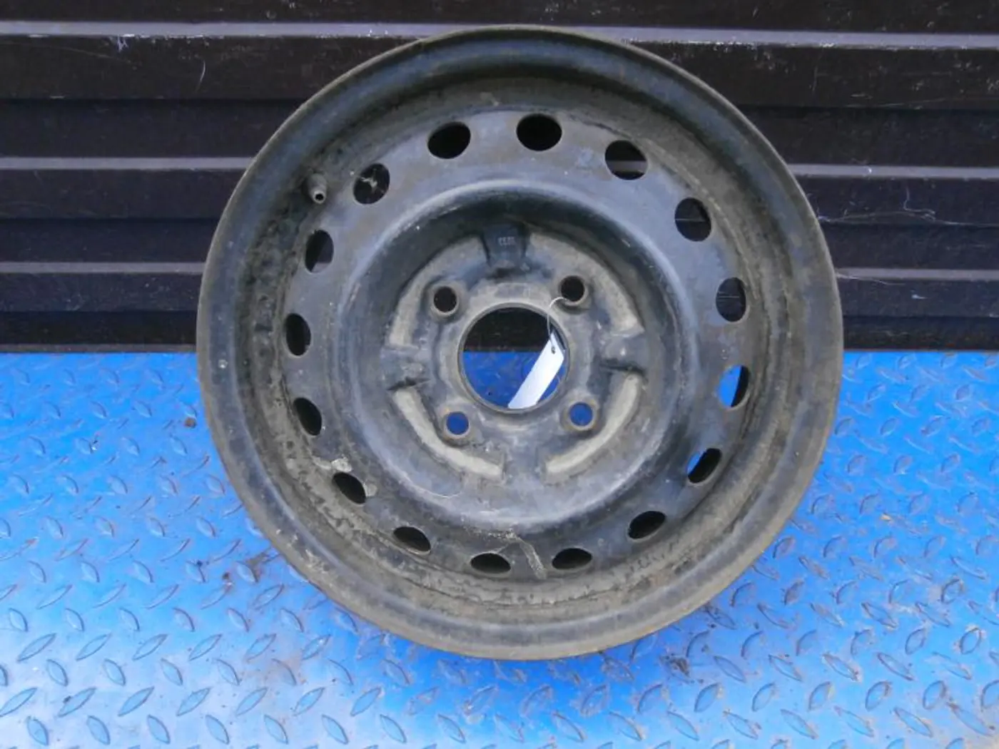 Диск штампованный к Nissan Almera 1995
