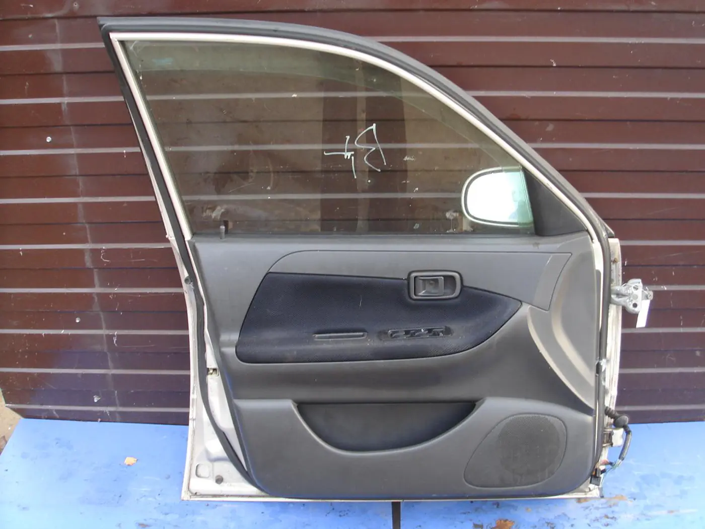 Стеклоподъемник электрический передний левый к Daihatsu Sirion 2001