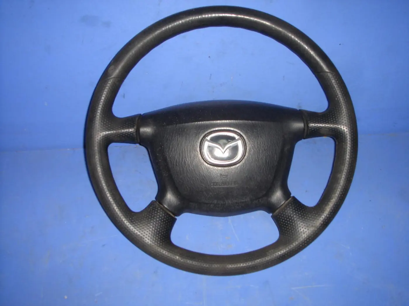 Руль к Mazda 323 2000