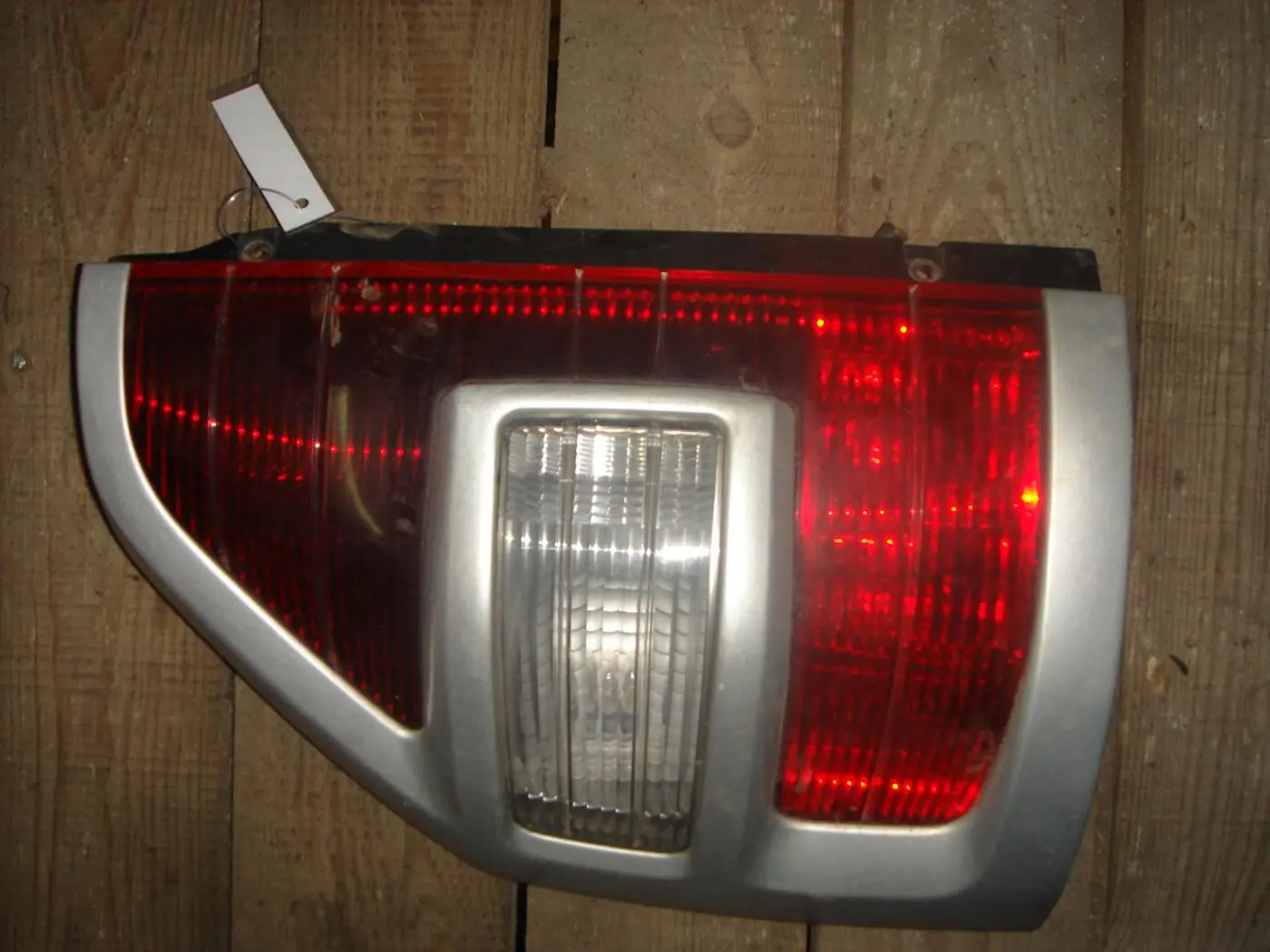 Фонарь задний левый к Mitsubishi Pajero 2002